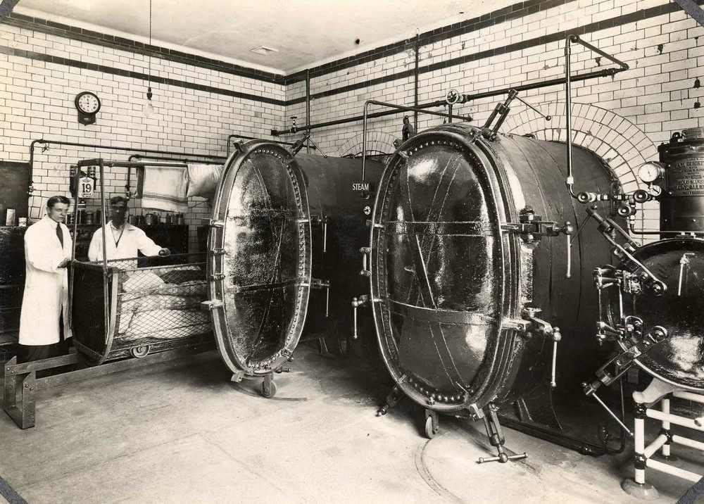 Disinfecting Station, ironing room in 1935, The hot water tank survives. Picture: Hackney Archives - Credit: Hackney Archives