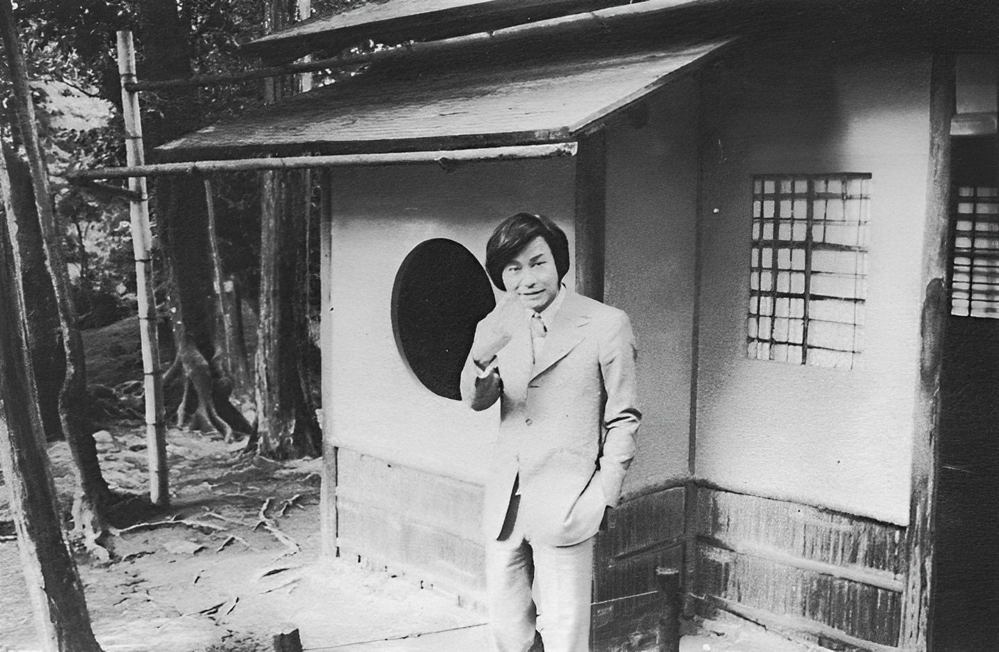 (1) These photos show Kurokawa outside his Nakagin Capsule Building and at the moss garden in Kyoto. The round hole motif is common to both his buildings and traditional architecture, a point he indicates here half jokingly: ‘Who me? ... I copied this?’