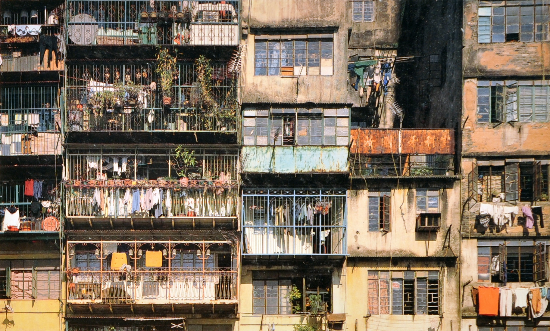 A typical section of external facade, horizontally uneven ond animated with balcony life.